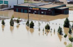 image of building in Medicine Hat surrunded by flood waters